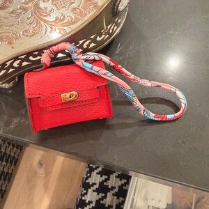 Red Handbag CHARM with Colorful Strap.